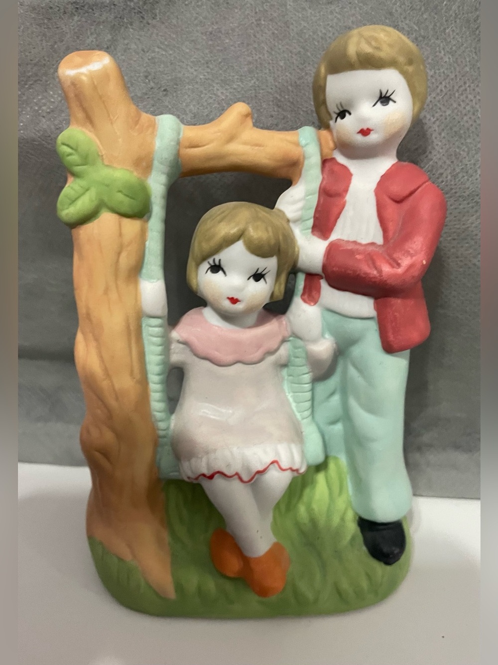Vintage-Inspired Pink & Mint Ceramic Swing Figurine